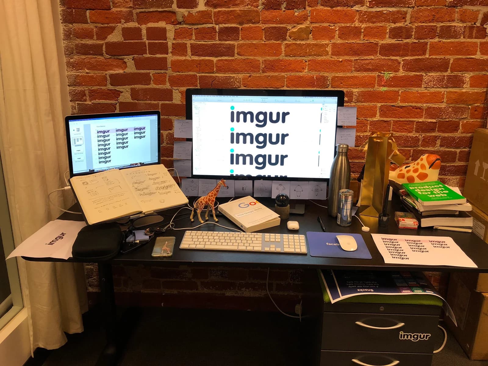 Imgur identity studies spread across a designer's workspace